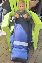 La chancelière chaude pour fauteuil roulant d'enfant