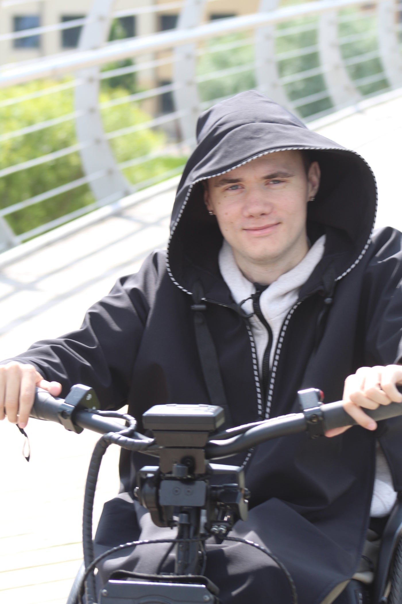 Atmungsaktiver Regenmantel für Rollstuhlfahrer