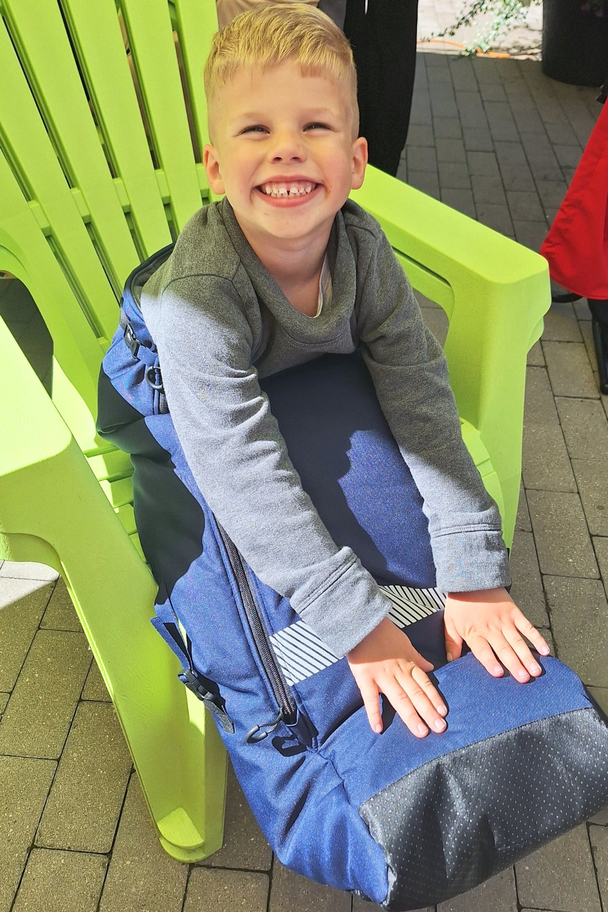 La chancelière chaude pour fauteuil roulant d'enfant