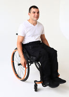 Black pants without pockets, wheelchair adapted