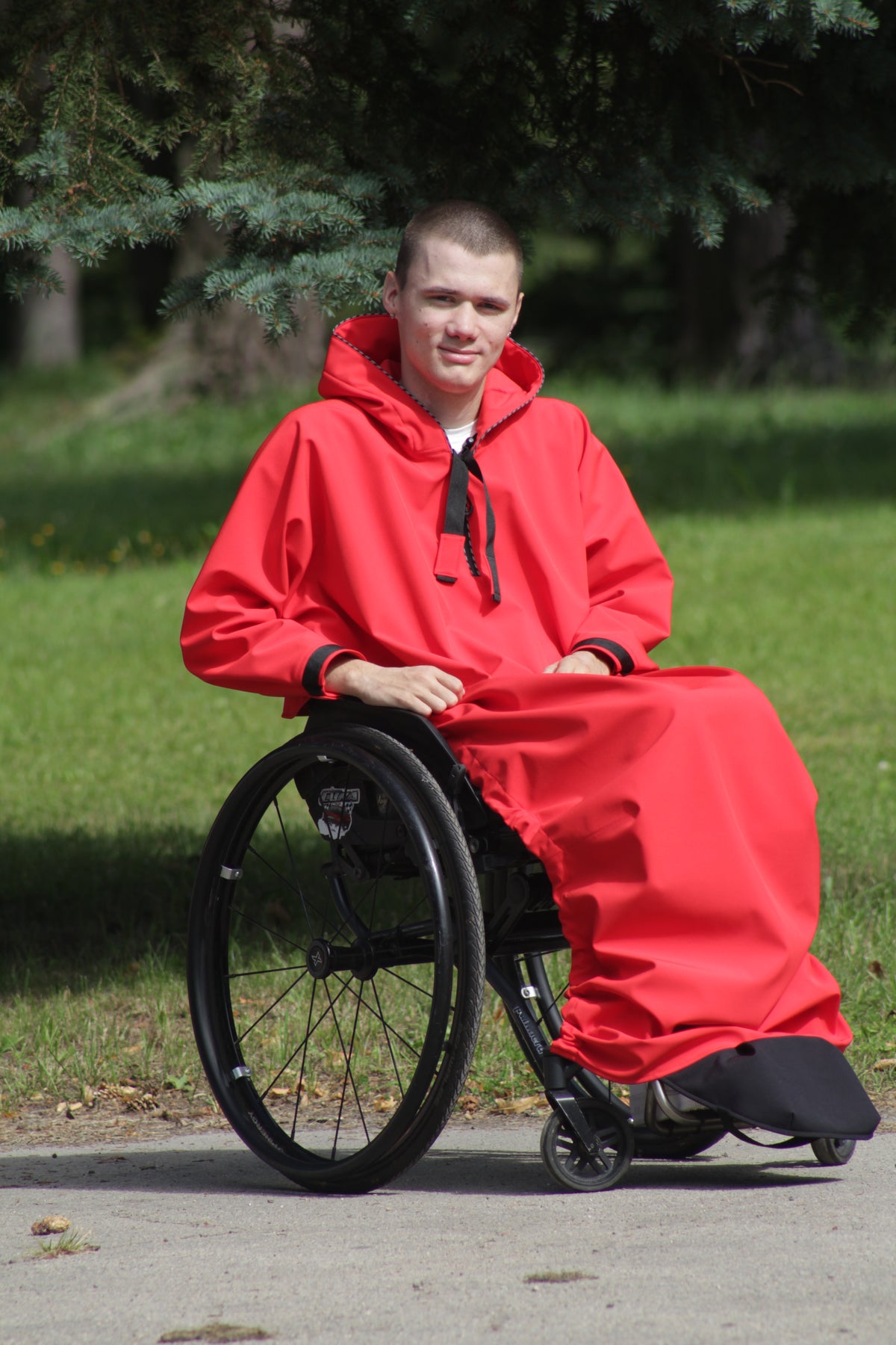Imperméable respirant prolongé adapté aux fauteuils roulants