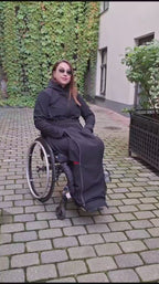 Wheelchair blanket with reflective elements and magnetic closure
