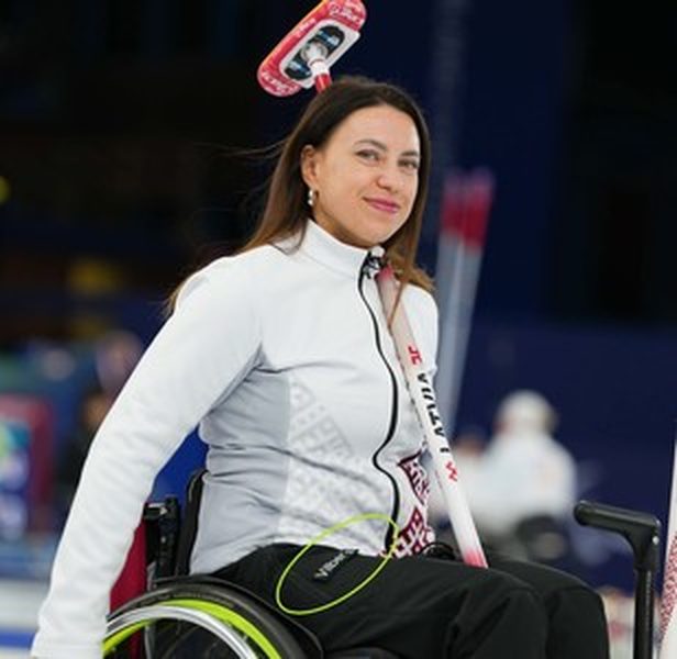 A wheelchair curling athlete in Vilber's clothing